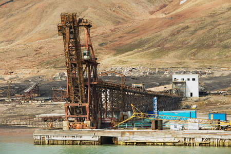 Pyramiden, Norway - September 03, 2011: View to the pier of abandoned Russian arctic settlement Pyramiden, Norway.のeditorial素材