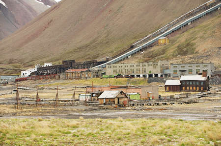 Pyramiden, Norway - September 03, 2011: View to the ruined coal mine in the abandoned Russian arctic settlement Pyramiden, Norway.のeditorial素材