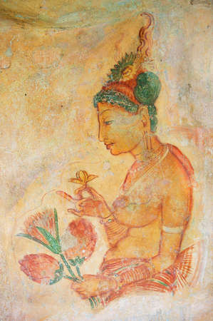 Sigiriya, Sri Lanka - May 20, 2011: Exterior of the ancient paintings at Sigiriya rock in Sigiriya,...