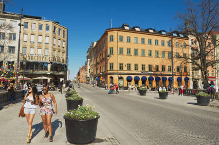 Uppsala, Sweden, April 25, 2011 - People walk by the street in Uppsala, Sweden.のeditorial素材