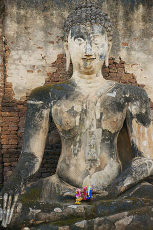 Sukhothai, Thailand - November 18, 2013: Exterior of the Buddha statue at Si Satchanalai in Sukhothai historical Park, Sukhothai, Thailand.のeditorial素材