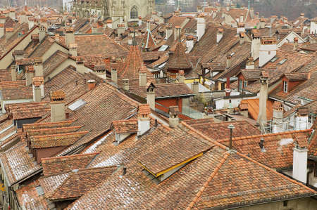 Bern, Switzerland - February 23, 2012: View to the roofs of the historical buildings from the famous Clock tower in Bern, Switzerland.のeditorial素材