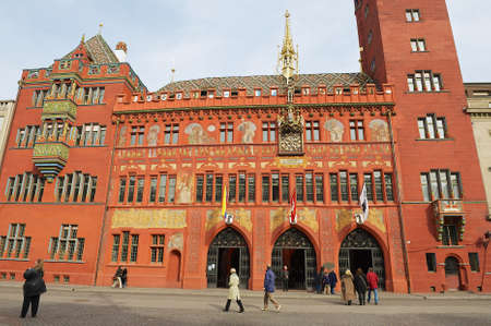 Basel, Switzerland, March 01, 2009 - People walk in front of the Town Hall buylding in Basel, Switzerland.のeditorial素材
