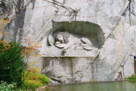 Lucerne, Switzerland - February 19, 2012: View to the Dying Lion monument in Lucerne, Switzerland. Carved in the rock to honor the Swiss Guards of Lois XVI of France.のeditorial素材