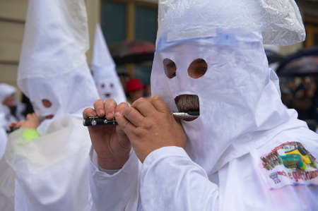 Basel, Switzerland, March 02, 2009 - Men play flutes at Basel Carnival in Basel, Switzerland.のeditorial素材