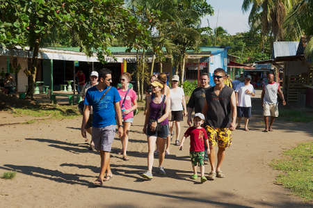 Tortuguero, Costa Rica, June 20, 2012 - People visit small town of Tortuguero, Costa Rica. Tortuguero is the base town for tourists to explore Tortuguero National Park.のeditorial素材