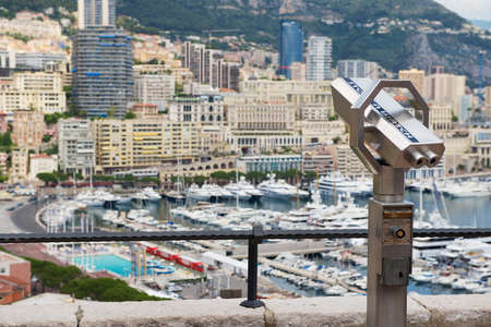 Monaco, Monaco - June 17, 2015: Exterior of the coin operated binocular at the viewpoint with the...
