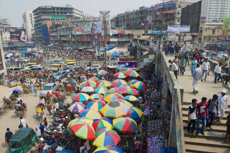 Dhaka, Bangladesh, February 22, 2014 - People do shopping at the Old market in Dhaka, Bangladesh. Dhaka is one of the most overpopulated cities in the world.のeditorial素材