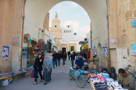 Sfax, Tunisia, November 30, 2011 - People pass through the medina in Sfax, Tunisia.のeditorial素材