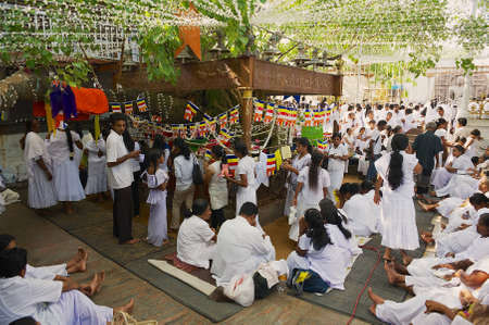 Colombo, Sri Lanka, May 17, 2011 - People celebrate Vesak festival in a Buddhist temple in Colombo,...