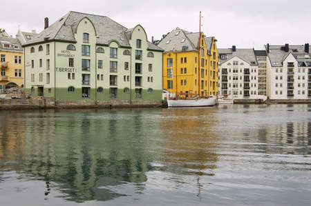 Alesund, Norway - June 03, 2010: View to the historical buildings in the harbor of Alesund, Norway.のeditorial素材