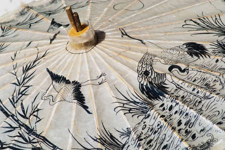 Traditional paper and bamboo umbrella handmade in Chiang Mai, Thailand.の写真素材