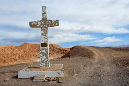 San Pedro De Atacama, Chile - October 24, 2013: Cross in the Atacama desert in memory of the pope Juan Pablo the Second visit near San Pedro de Atacama, Chile.のeditorial素材