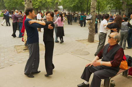 Beijing, China, May 01, 2009 - Chinese people dance in Jingshan Park in Beijing, China.のeditorial素材