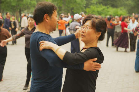 Beijing, China, May 01, 2009 - Chinese people dance in Jingshan Park in Beijing, China.のeditorial素材