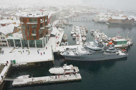 Svolvaer, Norway - March 26, 2011: View to the Svolvaer harbor in snowfall in Svolvaer, Norway.のeditorial素材
