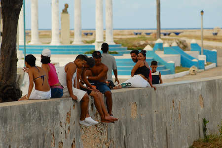 Havana, Cuba, October 22, 2006 - People at the sea-front in Cojimar, Cuba. Cojimar was the place where Ernest Hemingway wrote The Old Man and the Sea.のeditorial素材