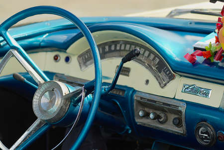 Havana, Cuba - October 22, 2006: Interior of a blue vintage Cadillac car parked at the street in Havana, Cuba. American classic cars are often used as taxis for tourists in Havana.のeditorial素材