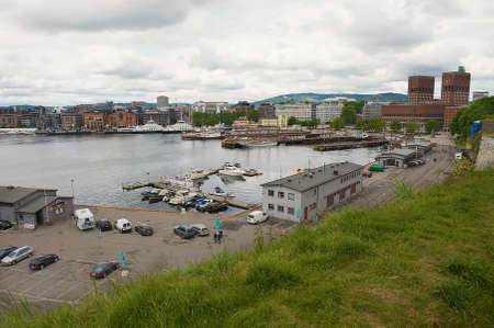 OSLO, NORWAY - JUNE 03, 2012: View to the harbor and Oslo city hall building in Oslo, Norway.のeditorial素材