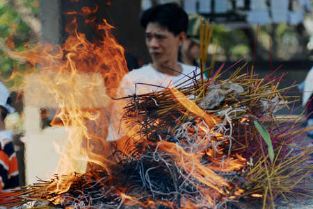Ho Chi Minh, Vietnam - February 17, 2007: Plenty of the incense sticks burn during the traditional ceremony with Ho Chi Minh, Vietnam.のeditorial素材
