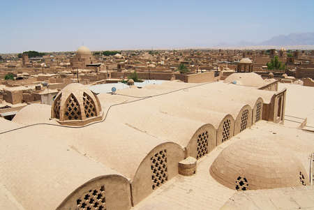 Yazd, Iran - June 17, 2007: View to the roofs of the old buildings in the historical part of the Yazd city, Iran.のeditorial素材