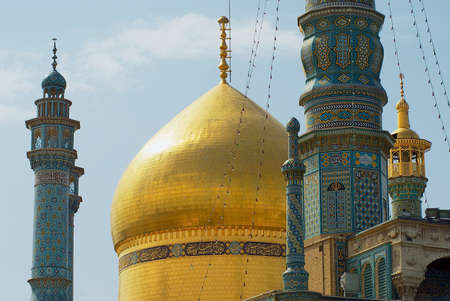 Qom, Iran - June 26, 2007: View to the minarets of the Fatima Masumeh Shrine in Qom, Iran. Shia Muslims consider Qom as one of the most sacred cities in Iran.のeditorial素材