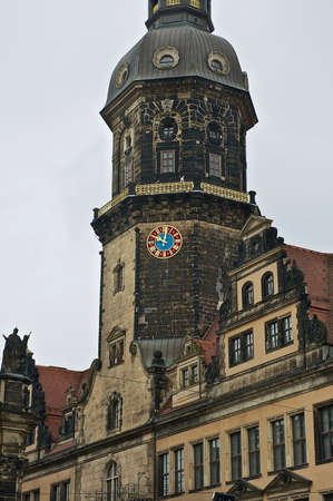 Dresden, Germany - May 22, 2010: View to the clock tower of the Royal Palace building in Dresden, Germany.のeditorial素材