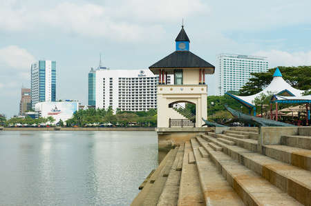 Kuching, Malaysia - August 26, 2009: View to the riverside and modern hotels buildings in Kuching, Malaysia.のeditorial素材