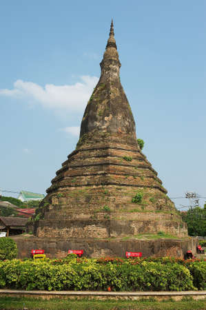 Vientiane, Laos - April 22, 2012: That Dam old Pagoda in Vientiane, Laos.