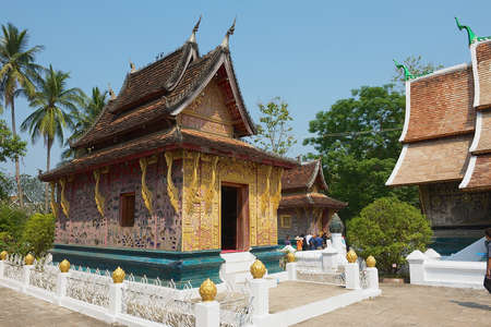 Luang Prabang, Laos, April 16, 2012 - People visit Wat Xieng Thong in Luang Prabang, Laos.のeditorial素材