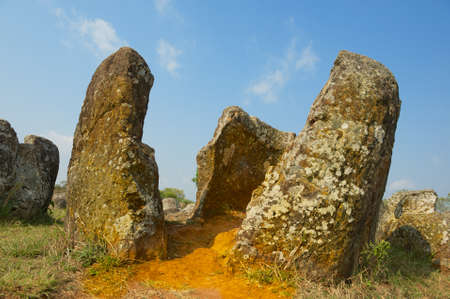 Ancient stone jars in a Plain of Jars near Phonsavan, Xienghouang province, Laos.の写真素材