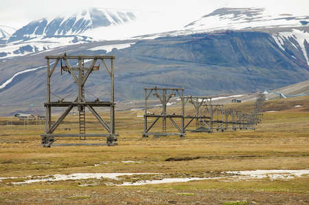 View to the abandoned arctic coal mine equipment in Longyearbyen, Norway. This unique equipment was...