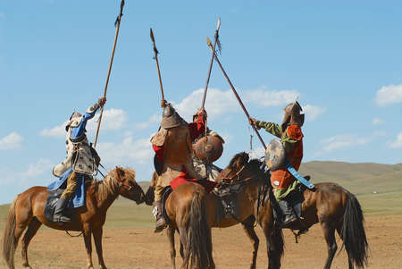 ULAANBAATAR, MONGOLIA - AUGUST 17, 2006: Mongolian horse riders take part in the traditional historical show of Genghis Khan era in Ulaanbaatar, Mongolia.のeditorial素材