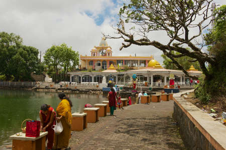 Grand Bassin, Mauritius - December 02, 2012: People visit Ganga Talao (Grand Bassin) Hindu temple, Mauritius.のeditorial素材