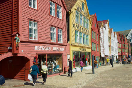 Bergen, Norway - June 06, 2010: People walk at Bryggen in Bergen, Norway.のeditorial素材