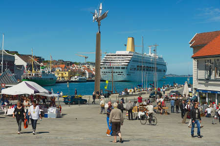 Stavanger, Norway - June 04, 2010: People walk by the seaside street in Stavanger, Norway. Stavanger city is often calledのeditorial素材