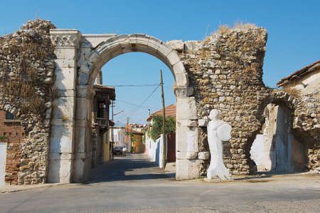 Milas, Turkey - August 14, 2009: Ancient roman stone town gate in Milas, Turkey.のeditorial素材