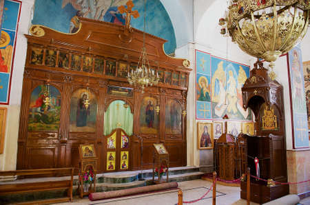 Madaba, Jordan - August 18, 2012: Interior of the Byzantine church of Saint George in Madaba, Jordan. The church home to the famous 6-th century Mosaic Map of Jerusalem and the Holy Land.のeditorial素材