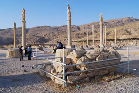 SHIRAZ, IRAN - JUNE 19, 2007: People visit ruins of Persepolis in Shiraz, Iran. Persepolis is a UNESCO World Heritage site.のeditorial素材