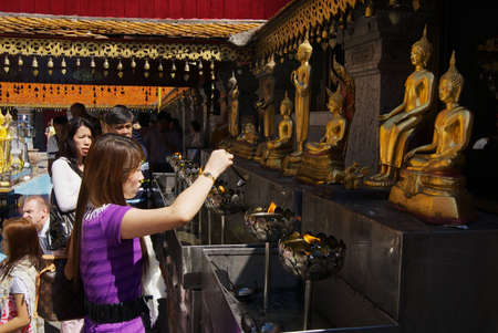 Chiang Mai, Thailand - November 12, 2008: Unidentified people pray at the Wat Phra That Doi Suthep, Buddhist temple in Chiang Mai, Thailand.のeditorial素材