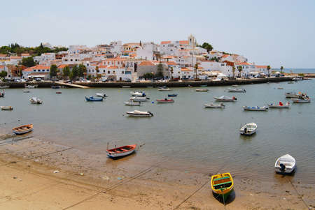 Ferragudo, Portugal - July 18, 2006: View to Ferragudo town from across the Rio Arade on July 18, 2006 in Ferragudo, Portugal.のeditorial素材