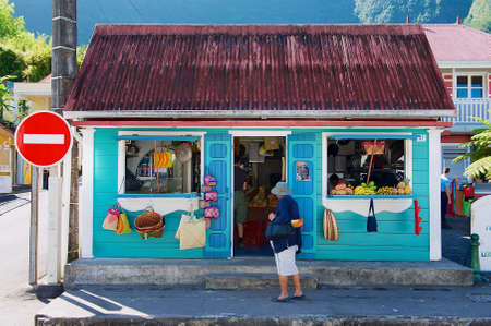 Saint-Denis De La Reunion, France - December 07, 2010: Colorful souvenir and fruit shop building at the town of Fond de Rond Point in Saint-Denis De La Reunion, France.のeditorial素材