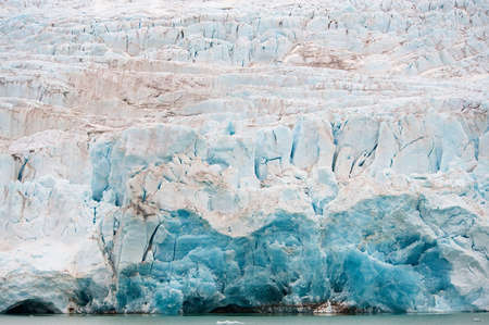 NordenskiÃ¶ldbreen glacier in summer near Pyramiden on the coast of Billefjord at Svalbard.の写真素材
