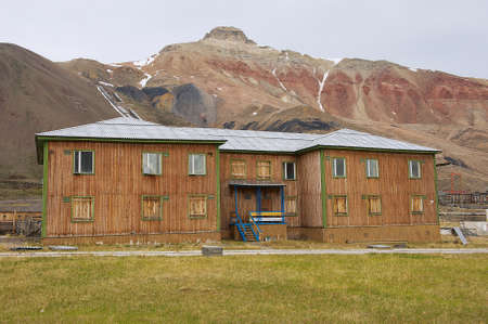 Pyramiden, Norway - September 03, 2011: Deserted old wooden residential building at the abandoned Russian arctic settlement Pyramiden, Norway.のeditorial素材