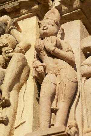 Erotic sculpture at Vishvanatha Temple at the  Western temples of Khajuraho in Madhya Pradesh, India.の写真素材