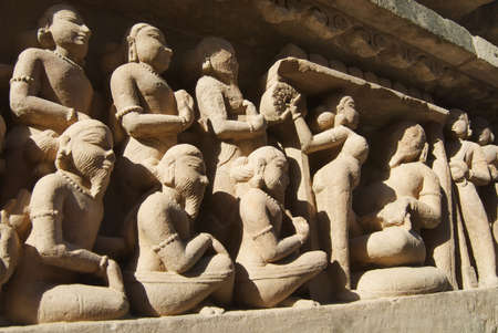 Erotic sculptures at Vishvanatha Temple at the  Western temples of Khajuraho in Madhya Pradesh, India.の写真素材