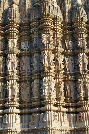 Facade of the Vishvanatha Temple with erotic sculptures at the  Western temples of Khajuraho in Madhya Pradesh, India.の写真素材