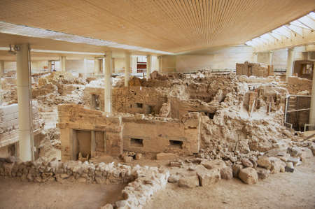 Akrotiri, Greece - August 01, 2012: Ruins of the ancient buildings from the Minoan Bronze Age at the archaeological site in Akrotiri, Greece.のeditorial素材