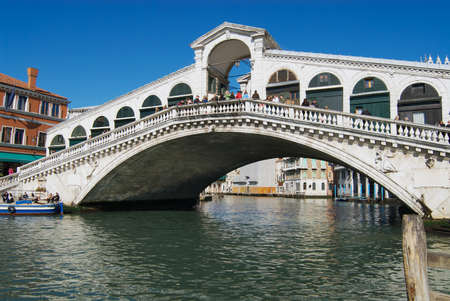 Venice, Italy - February 26, 2007: View of the landmark Ponte di Rialto bridge over the Grand Canal in Venice, Italy.のeditorial素材
