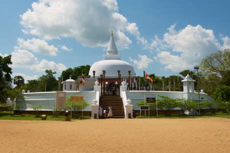 Anuradhapura, Sri Lanka - May 19, 2011: Unidentified people go to Lankaramaya stupa in Anuradhapura, Sri Lanka.のeditorial素材